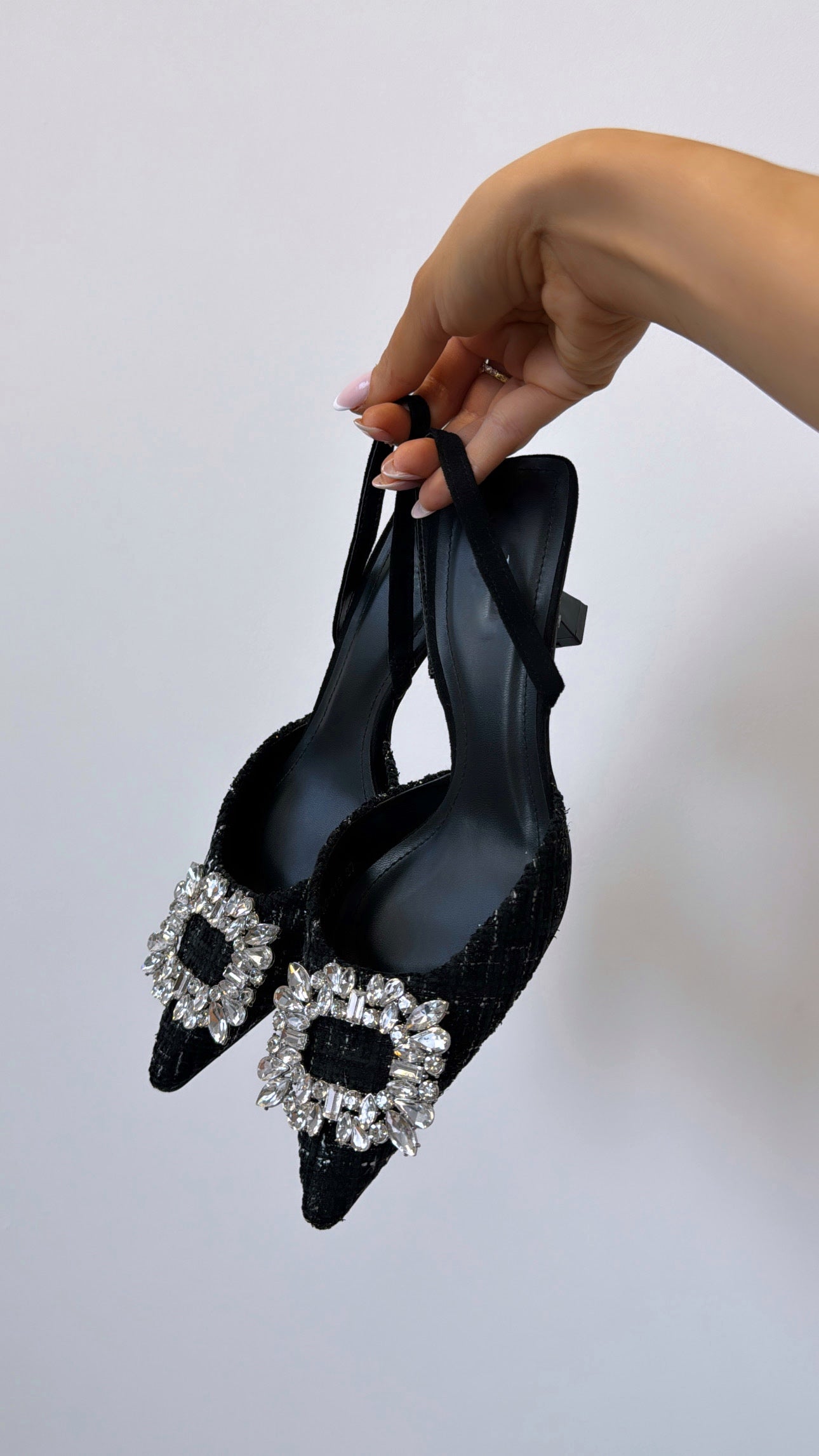 Schwarze Strass-Absätze