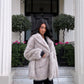 Veste fourrure ceinturée beige