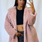 Manteau en fourrure rose